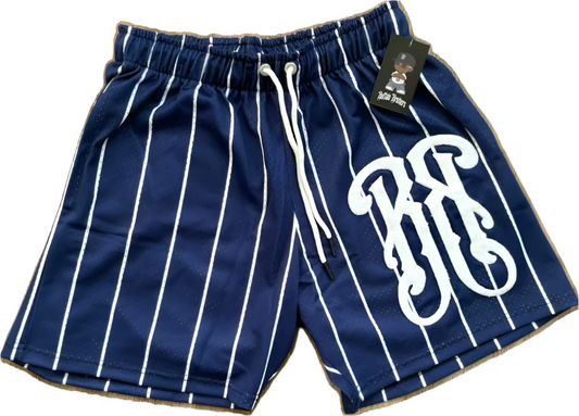 Navy blue shorts with white pinstripes and monogram on a white background